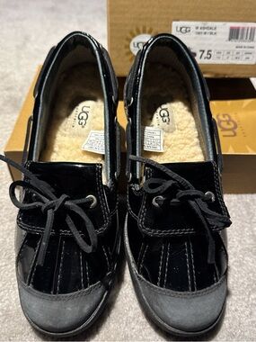 UGG Black Patent Moccasin Slippers with Cream Shearling